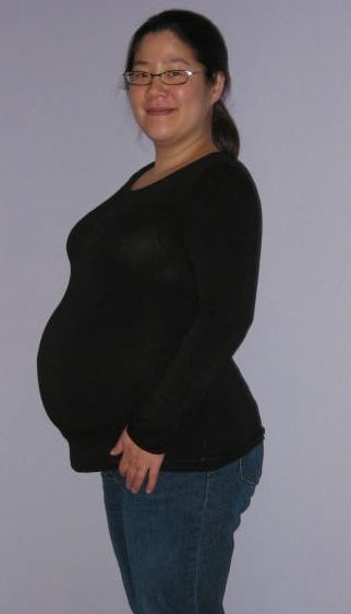 Me, two weeks before giving birth. Being large was fun because when else do you get to pack it on?